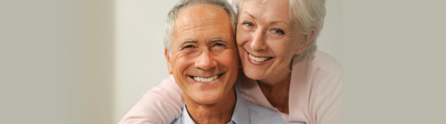 elderly couple smiling