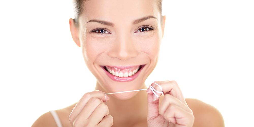 woman flossing